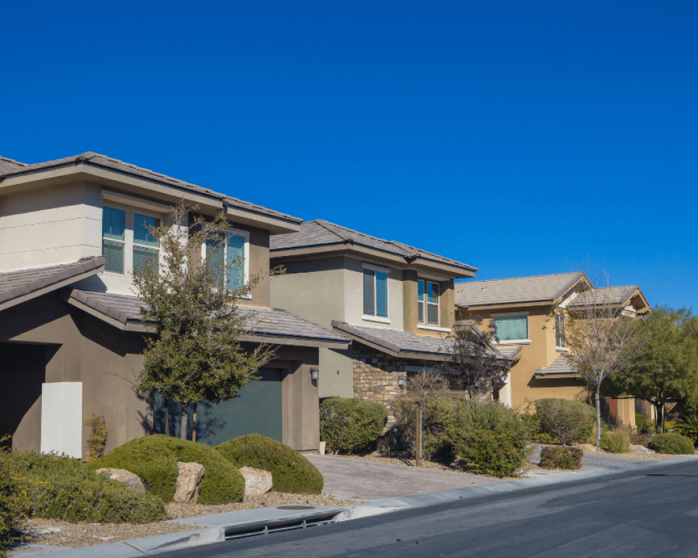Modern residential home with a well-maintained garage door, representing professional garage door services.